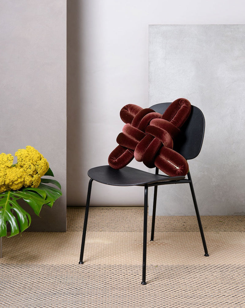 Glowing Rust Velvet Knot Pillow