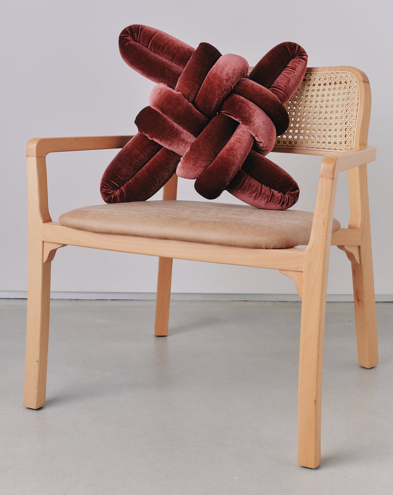 Glowing Rust Velvet Knot Pillow