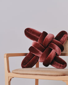 Glowing Rust Velvet Knot Pillow